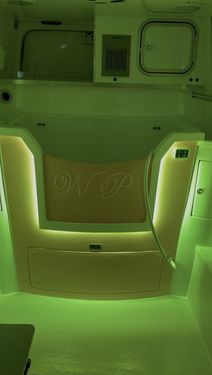 Yellow mood lighting setting in a Wet Pets van conversion