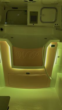 light yellow mood lighting setting in a Wet Pets van conversion